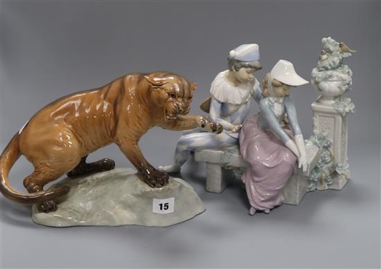 A Beswick model mountain lion and a Nao figure group